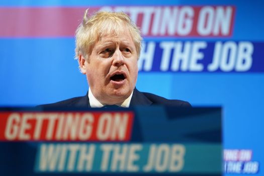 BLACKPOOL, ENGLAND – MARCH 19: British Prime Minister Boris Johnson addresses delegates during the Conservative Party Spring Conference at Blackpool Winter Gardens on March 19, 2022 in Blackpool, England. (Photo by Ian Forsyth/Getty Images)