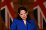 Priti Patel unlawfully seized asylum seekers’ phones, court rules