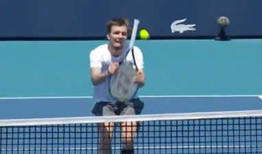 Tennis star pulls off unbelievable trick shot using handle of racket