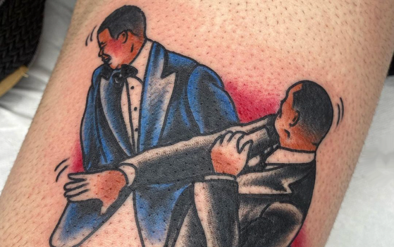 Tattoos of Will Smith slapping Chris Rock