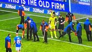 Glass on pitch delays second half of Old Firm