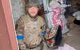 Moment Ukrainian MMA champion recovers championship belt from bombed home