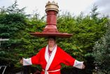 UK’s strongest grandad celebrates 100th world record by balancing 14st crown on head