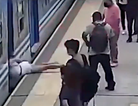 Shocking moment woman faints, falls under moving train and miraculously survives