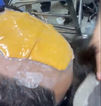 Video shows how man hid $40k worth of gold under his toupee