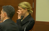 Amber Heard wipes tears as Johnny Depp trial mentions romantic relationship with Elon Musk