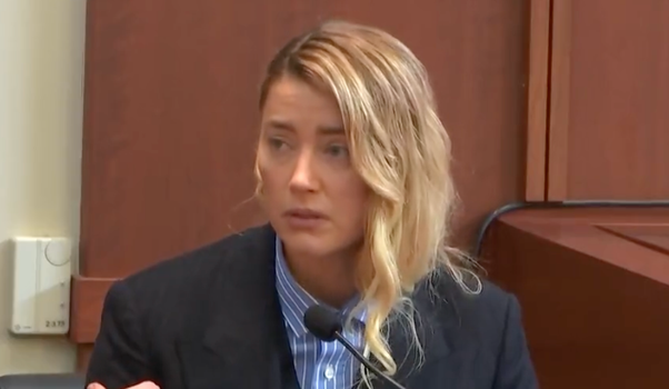 Amber Heard says Depp hit her in drink-fuelled rages