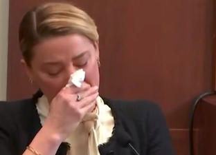 Amber Heard breaks down as she claims Johnny Depp sexually assaulted her with a bottle