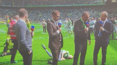 Celtic pitch invader spectacularly floored by steward during live interview