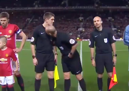 Mike Dean referee sniffed