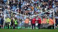 Man City fans break crossbar during pitch invasion