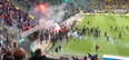 ADO Den Haag fans launch flares at opposition fans after play-off loss