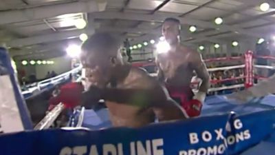 Boxer taken to hospital after punching invisible opponent during title fight