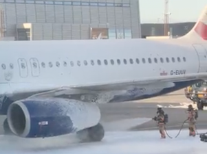 British Airways jet catches fire as passengers and crew are evacuated after flight from London
