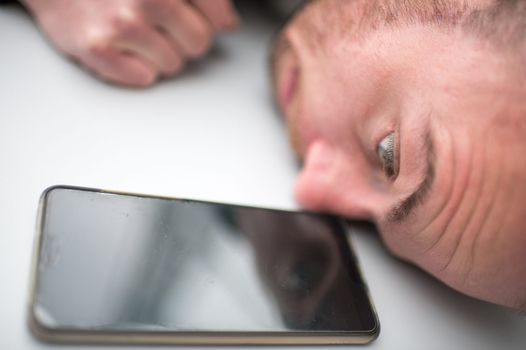 Man waiting for text back / being ghosted