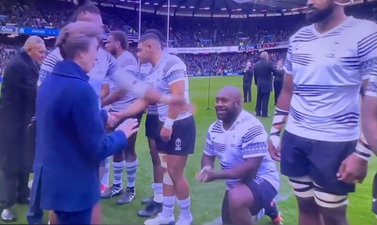 Fiji rugby players respectfully kneel for Princess Anne before Scotland match