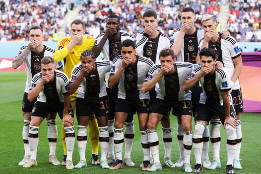 Germany players cover their mouths in FIFA protest
