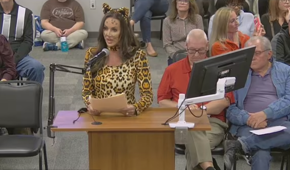An Arizona mother decided to dress up as a cat for a school board meeting in protest against  the school's so-called "woke agenda."