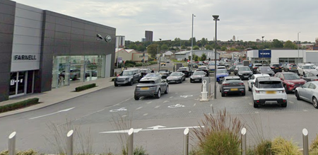 Woman and child killed after Audi crashes into Jaguar dealership in Leeds