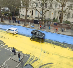 Huge Ukraine flag painted outside Russian embassy in London