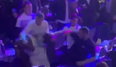 UFC star caught on camera punching rapper in mass brawl