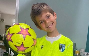 Young boy dies after being crushed by two cars while changing boots