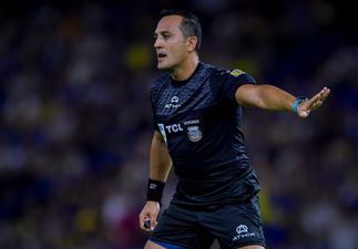 Referee gives bizarre red card to player moments after running into him