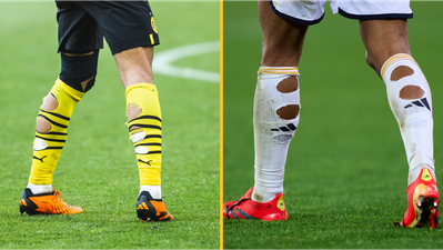 The reason footballers cut holes in their socks before matches