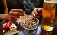 Government scrap planned ban on smoking outside pubs